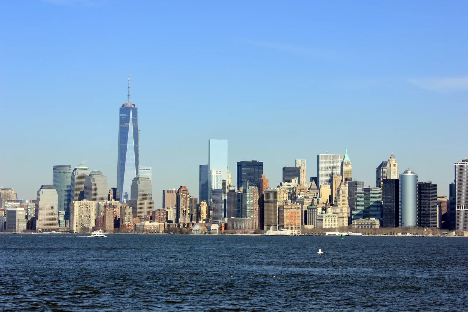 Lower Manhattan skyline and One World Trade Center across New York Harbor