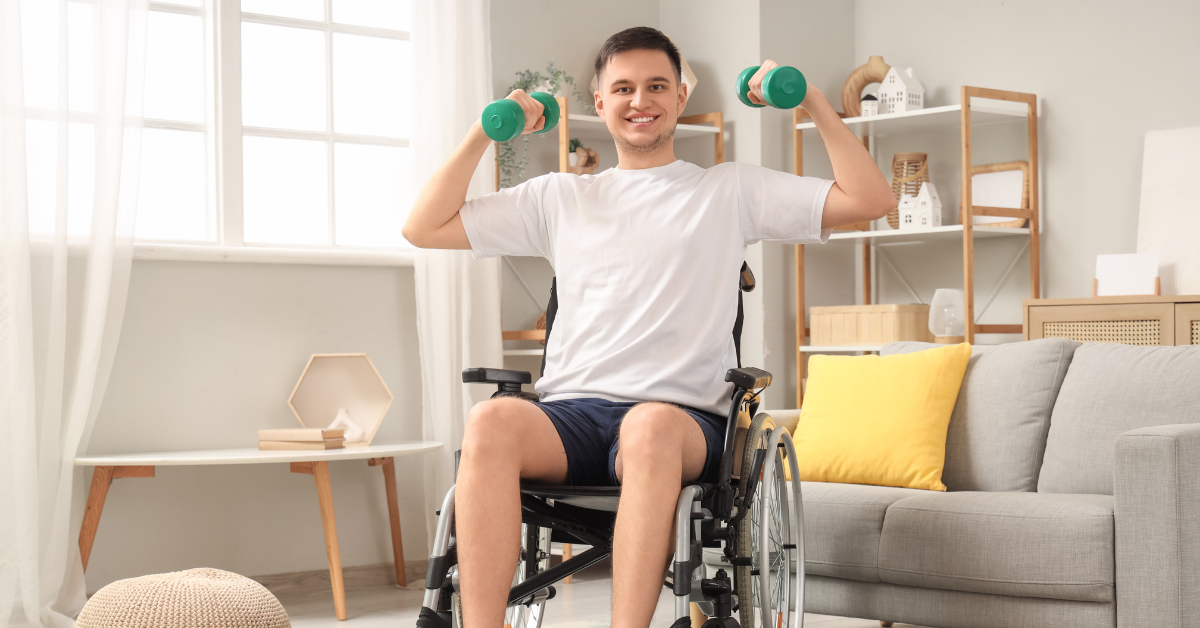 Man lifting weights into the air while seated in his wheelchair
